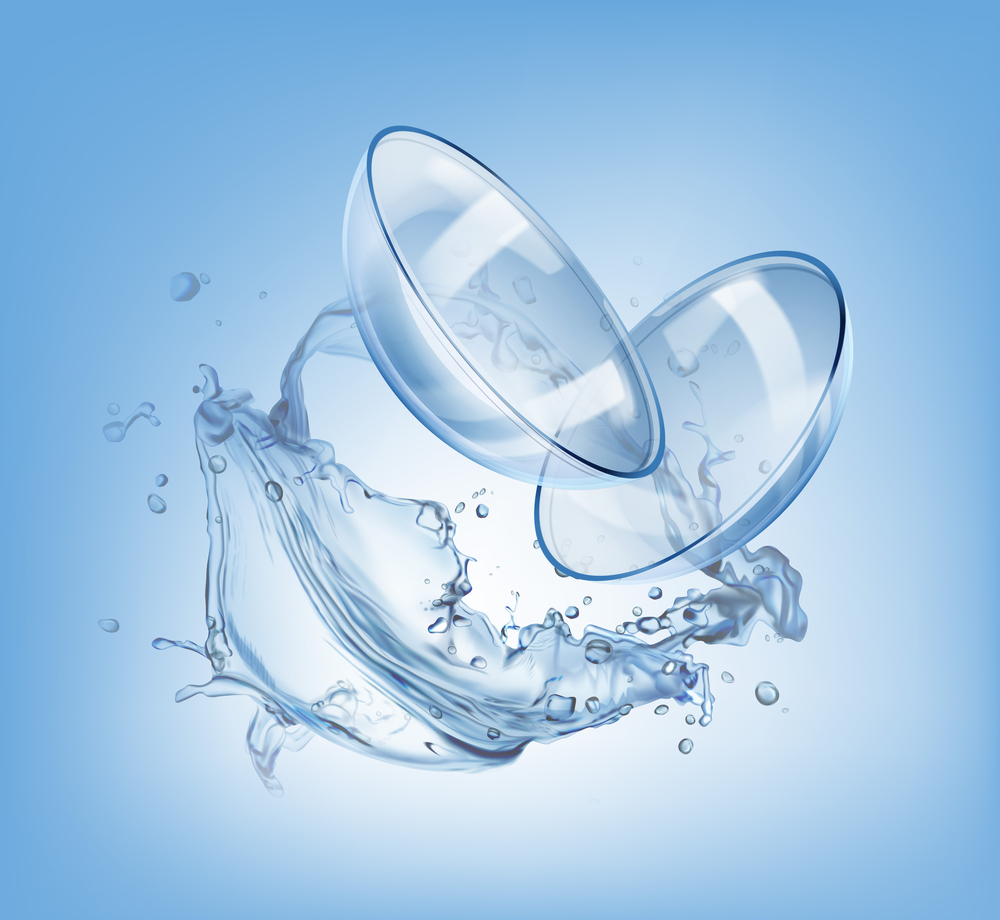 Illustration of scleral contact lenses surrounded by a splash of liquid, symbolizing hydration and precision fitting